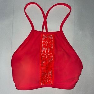 Coral bikini top with woven details and cross back